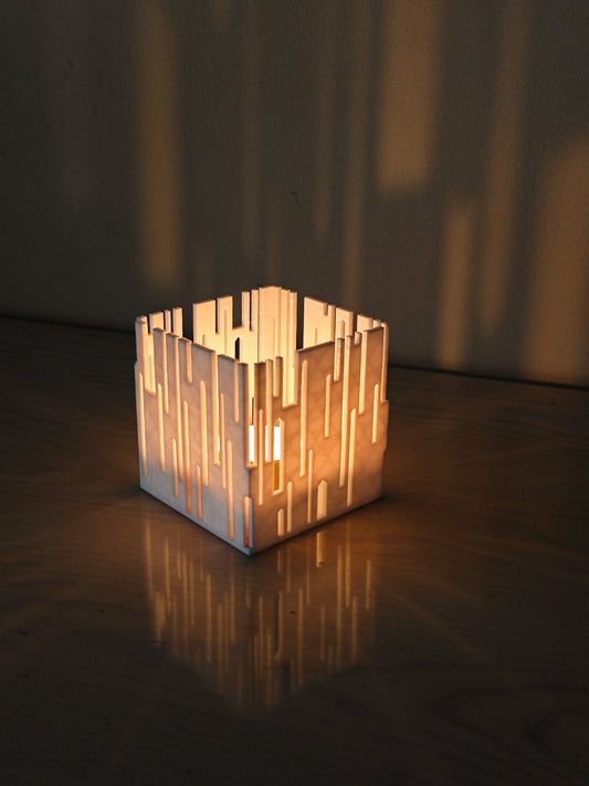 3D printed CityCube candle holder glowing like a tiny city skyline